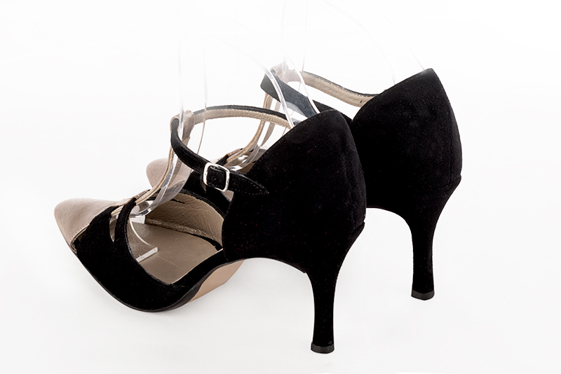 Tan beige and matt black women's T-strap open side shoes. Tapered toe. High slim heel. Rear view - Florence KOOIJMAN
